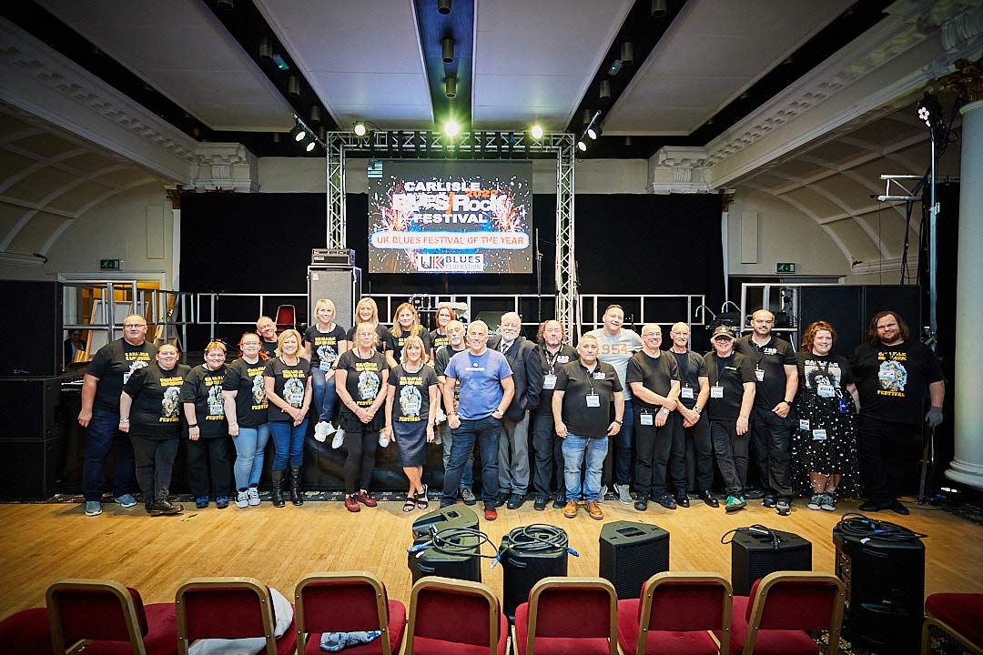 The Carlisle Blues and Rock Festival crew wearing festival t-shirts sponsored by Form